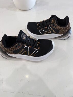 New Balance Women’s Black Sneakers with Leopard Accents